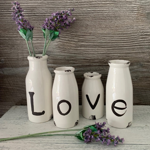 Set of Four Ceramic Vintage LOVE Bottles